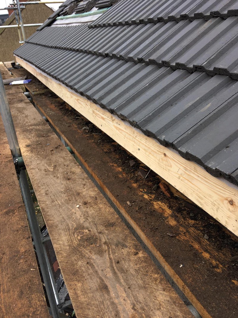 New concrete roof tiles and fascia by Brandals